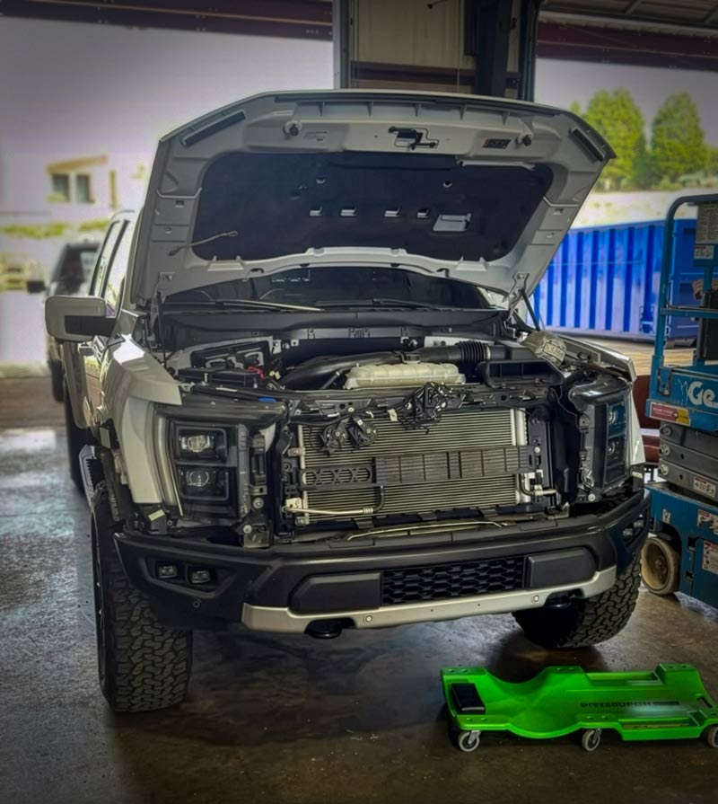 Fleet truck receiving on-site diagnostics and electrical repair by Guardian Lighting & Sound Greenville SC